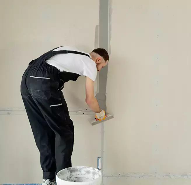 Why Choose Spectrum Restoration Pros for Fixing Water Damaged Drywall in Coralville, IA?